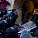 WASHINGTON D.C., USA - JANUARY 6: Trump supporters clash with police and security forces as people try to storm the US Capitol in Washington D.C on January 6, 2021. - Demonstrators breeched security and entered the Capitol as Congress debated the 2020 presidential election Electoral Vote Certification. (photo by Brent Stirton/Getty Images)