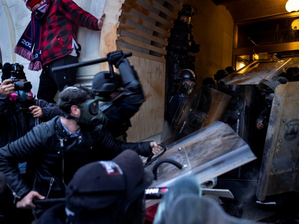 WASHINGTON D.C., USA - JANUARY 6: Trump supporters clash with police and security forces as people try to storm the US Capitol in Washington D.C on January 6, 2021. - Demonstrators breeched security and entered the Capitol as Congress debated the 2020 presidential election Electoral Vote Certification. (photo by Brent Stirton/Getty Images)