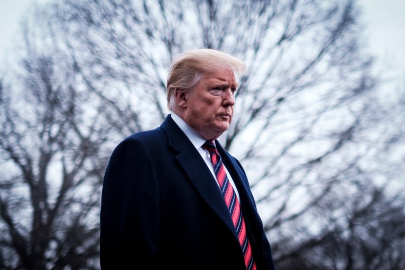 WASHINGTON, DC - JANUARY 19: President Trump stops to speak to reporters as he prepared to board Marine One on the South Lawn of the White House on January 19, 2019 in Washington, DC. Trump is traveling to Dover Air Force Base in Delaware to visit with families four Americans who were killed in an explosion Wednesday in Syria. (Photo by Pete Marovich/Getty Images)