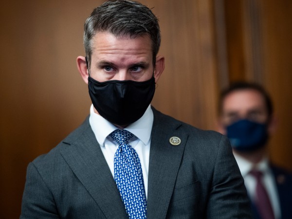 UNITED STATES - SEPTEMBER 30: Reps. Adam Kinzinger, R-Ill., left, and Mike Gallagher, R-Wis., attend a news conference on the China Task Force report in the Capitol’s Rayburn Room on Wednesday, September 30, 2020. The report outlines bipartisan action to combat threats from China. (Photo By Tom Williams/CQ Roll Call)