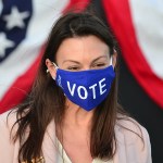 BOCA RATON, FL - OCTOBER 05:  Florida Commissioner of Agriculture and Consumer Services Nikki Fried (R) attends a 'Women for Biden' drive-in rally at Century Village in Boca Raton on October 5, 2020 in Boca Raton, Florida. Dr. Biden joined the Women for Biden drive-in rally to support her husband and Democratic presidential nominee Joe Biden, who was participating in an NBC town hall in Miami. (Photo by Johnny Louis/Getty Images)