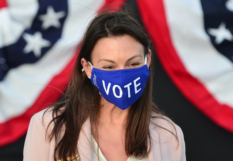 BOCA RATON, FL - OCTOBER 05:  Florida Commissioner of Agriculture and Consumer Services Nikki Fried (R) attends a 'Women for Biden' drive-in rally at Century Village in Boca Raton on October 5, 2020 in Boca Raton, Florida. Dr. Biden joined the Women for Biden drive-in rally to support her husband and Democratic presidential nominee Joe Biden, who was participating in an NBC town hall in Miami. (Photo by Johnny Louis/Getty Images)