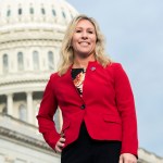 UNITED STATES - JANUARY 4: Rep. Marjorie Taylor Greene, R-Ga., is seen during a group photo with freshmen members of the House Republican Conference on the House steps of the Capitol on Monday, January 4, 2021. (Photo By Tom Williams/CQ Roll Call)