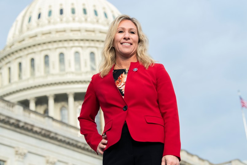 UNITED STATES - JANUARY 4: Rep. Marjorie Taylor Greene, R-Ga., is seen during a group photo with freshmen members of the House Republican Conference on the House steps of the Capitol on Monday, January 4, 2021. (Photo By Tom Williams/CQ Roll Call)