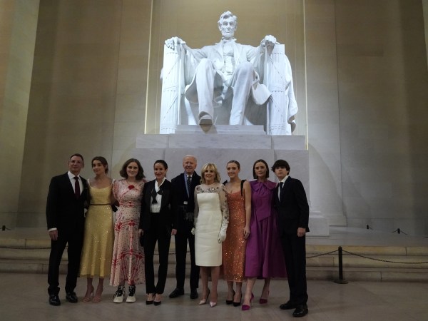 U.S. President Joe Biden and U.S. First Lady Jill Biden pose with their family in front of the statue of Abraham Lincoln at the "Celebrating America" event at the Lincoln Memorial after the inauguration of Joe Biden as the 46th President of the United States in Washington, U.S., January 20, 2021. REUTERS/Joshua Roberts/Pool