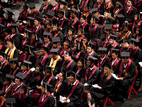 A commencement ceremony for a private, for-profit educational institution. (Photo by Brooks Kraft LLC/Corbis via Getty Images)