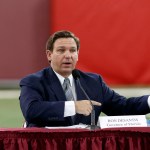 TALLAHASSEE, FL - AUGUST 11: Florida Governor Ron DeSantis speaks during a collegiate athletics roundtable about fall sports at the Albert J. Dunlap Athletic Training Facility on the campus of Florida State University on August 11, 2020 in Tallahassee, Florida. (Photo by Don Juan Moore/Getty Images) *** Local Caption *** Ron DeSantis