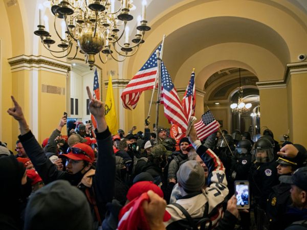 WASHINGTON D.C., USA - JANUARY 6: Supporters of US President Donald Trump protest inside the US Capitol on January 6, 2021, in Washington, DC. - Demonstrators breeched security and entered the Capitol as Congress debated the 2020 presidential election Electoral Vote Certification. (Photo by Brent Stirton/Getty Images)