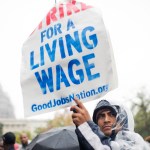 UNITED STATES - NOVEMBER 10: On the day of a Republican presidential debate, striking workers attend a rally in Upper Senate Park with Sen. Bernie Sanders, I-Vt., to call for a minimum wage of $15, November 5, 2015. Many of the low-wage workers hold jobs on Capitol Hill. (Photo By Tom Williams/CQ Roll Call)