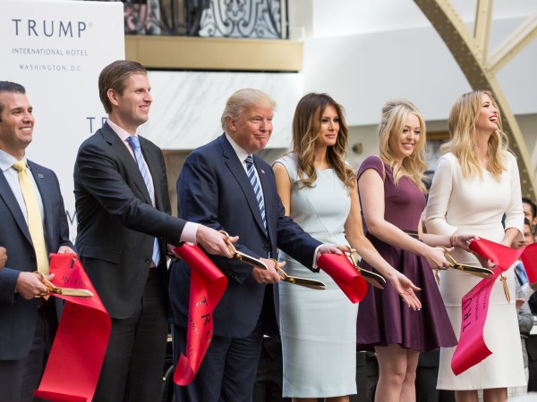 In the grand lobby of Trump international Hotel, (l-r), Donald Trump Jr.,  Eric Trump, U.S. Presidential candidate Donald J. Trump, Melania Trump, Tiffany Trump, and Ivanka Trump, cut the ribbon for their latest property, Trump International Hotel - Old Post Office, in Washington, DC on October 26, 2016. (Photo by Cheriss May/NurPhoto)