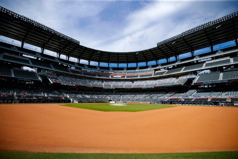 ATLANTA, GA - OCTOBER 08: Atlanta Braves fans watch game 3 of the National League Division Series between the Miami Marlins and Atlanta Braves at Truist Park on October 8, 2020 in Atlanta, Georgia. (Photo by Todd Kirkland/Getty Images)