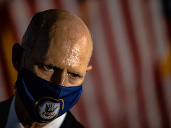 WASHINGTON, DC - OCTOBER 26: Senator Rick Scott (R-FL) talks to reporters as he leaves the Republicans Policy Luncheon on October 26, 2020 in Washington, DC. It is expected that the Senate will vote on the nomination of Judge Amy Coney Barrett to be an Associate Justice of the Supreme Court later in the day. (Photo by Samuel Corum/Getty Images) *** Local Caption *** Rick Scott