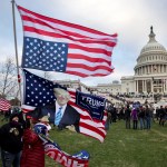 nation's capital to protest the ratification of President-elect Joe Biden's Electoral College victory over President Trump in the 2020 election. A pro-Trump mob later stormed the Capitol, breaking windows and clashing with police officers. Five people died as a result.  (Photo by Brent Stirton/Getty Images)