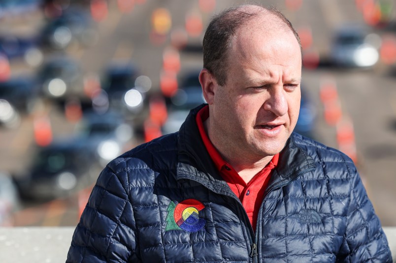 DENVER, CO - JANUARY 30: Colorado governor Jared Polis speaks to the media at a mass COVID-19 vaccination event on January 30, 2021 in Denver, Colorado. UCHealth, Colorado’s largest healthcare provider, plans to vaccinate 10,000 seniors over 70 during the drive-up event this weekend. (Photo by Michael Ciaglo/Getty Images)