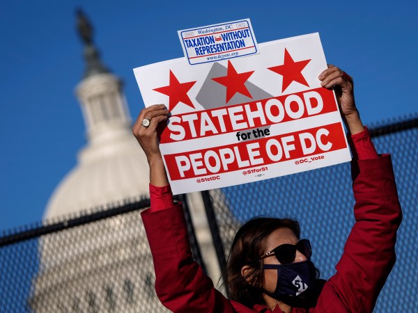 WASHINGTON, DC - MARCH 22: Residents of the District of Columbia rally for statehood near the U.S. Capitol on March 22, 2021 in Washington, DC. On Monday, the House Oversight Committee is holding a hearing on legislation that the House passed last summer that would establish the District of Columbia as the 51st state. The District has a population of nearly 700,000 residents. (Photo by Drew Angerer/Getty Images)