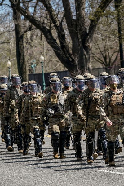 WASHINGTON, DC - APRIL 2: National Guard troops arrive along Constitution Avenue as law enforcement responds to a security incident near the U.S. Capitol on April 2, 2021 in Washington, DC. (Photo by Drew Angerer/Getty Images)