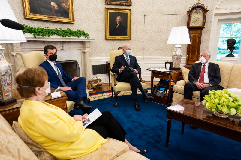 President Joe Biden makes remarks during a meeting with with a bipartisan group of Members of Congress to discuss historic investments in the American Jobs Plan, in the Oval Office at the White House, Monday, April, 19, 2021. (Photo by Doug Mills/The New York Times)