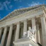 The Guardian or Authority of Law, created by sculptor James Earle Fraser, rests on the side of the U.S. Supreme Court on September 28, 2020 in Washington, DC.