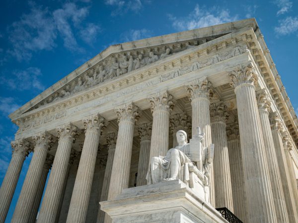 The Guardian or Authority of Law, created by sculptor James Earle Fraser, rests on the side of the U.S. Supreme Court on September 28, 2020 in Washington, DC.