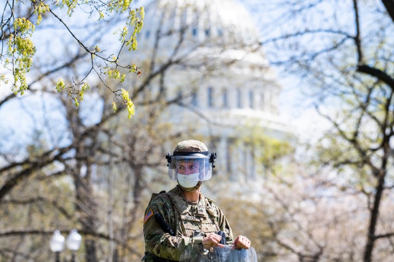 UNITED STATES - APRIL 2: U.S. National Guardsmen stand guard near Constitution Avenue NW after a man was shot during a confrontation with Capitol Police at the north barricade entrance to the Capitol on Friday, April 2, 2021. (Photo By Tom Williams/CQ Roll Call)