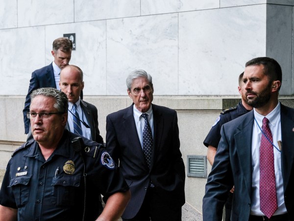 WASHINGTON, DC - JULY 24: Former Special Counsel Robert Mueller (center) is seen leaving after testifying to the House Judiciary Committee about his report on Russian interference in the 2016 presidential election on Capitol Hill on July 24, 2019 in Washington, DC. Mueller dismissed President Trump's claims of total exoneration before the House Judiciary Committee earlier in the day on Wednesday. (Photo by Alex Wroblewski/Getty Images)
