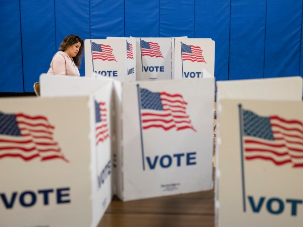 ARLINGTON, VA - MARCH 03: A woman marks down her vote on a ballot for the Democratic presidential primary election at a polling place in Armstrong Elementary School on Super Tuesday, March 3, 2020 in Arlington, Virginia. 1,357 Democratic delegates are at stake as voters cast their ballots in 14 states and American Somoa on what is known as Super Tuesday. (Photo by Samuel Corum/Getty Images)