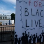 WASHINGTON D.C., June 20, 2020 -- A sign is seen during protests against racial injustice to mark Juneteenth, commemorating the end of slavery in the United States, near the White House in Washington, D.C., the United States, June 19, 2020. This year's Juneteenth comes amid nationwide demonstrations against police brutality and racism triggered by the death of George Floyd in police custody. More than 20 rallies, marches and events were scheduled for Friday in Washington, D.C., with hundreds more in over 40 states, according to the Movement for Black Lives, a coalition of U.S. groups representing the interests of black communities. (Photo by Liu Jie/Xinhua via Getty)