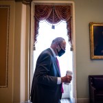 WASHINGTON, DC - AUGUST 10: U.S. Senate Majority Leader Chuck Schumer (D-NY) heads to his office in the U.S. Capitol Building on August 10, 2021 in Washington, DC. The Senate will vote today on the $1 trillion infrastructure bill ahead of August recess. (Photo by Samuel Corum/Getty Images) *** Local Caption *** Chuck Schumer