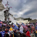 WASHINGTON D.C., USA - JANUARY 6: Trump supporters clash with police and security forces as people try to storm the US Capitol in Washington D.C on January 6, 2021. Demonstrators breeched security and entered the Capitol as Congress debated the 2020 presidential election Electoral Vote Certification. (photo by Brent Stirton/Getty Images)