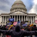nation's capital to protest the ratification of President-elect Joe Biden's Electoral College victory over President Trump in the 2020 election. A pro-Trump mob later stormed the Capitol, breaking windows and clashing with police officers. Five people died as a result. (Photo by Brent Stirton/Getty Images)