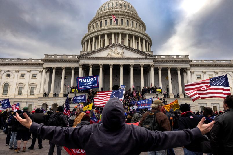 nation's capital to protest the ratification of President-elect Joe Biden's Electoral College victory over President Trump in the 2020 election. A pro-Trump mob later stormed the Capitol, breaking windows and clashing with police officers. Five people died as a result.  (Photo by Brent Stirton/Getty Images)