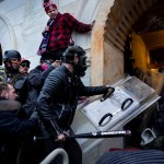 WASHINGTON D.C., USA - JANUARY 6: Trump supporters clash with police and security forces as people try to storm the US Capitol in Washington D.C on January 6, 2021. - Demonstrators breeched security and entered the Capitol as Congress debated the 2020 presidential election Electoral Vote Certification. (photo by Brent Stirton/Getty Images)