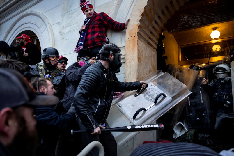 WASHINGTON D.C., USA - JANUARY 6: Trump supporters clash with police and security forces as people try to storm the US Capitol in Washington D.C on January 6, 2021. - Demonstrators breeched security and entered the Capitol as Congress debated the 2020 presidential election Electoral Vote Certification. (photo by Brent Stirton/Getty Images)