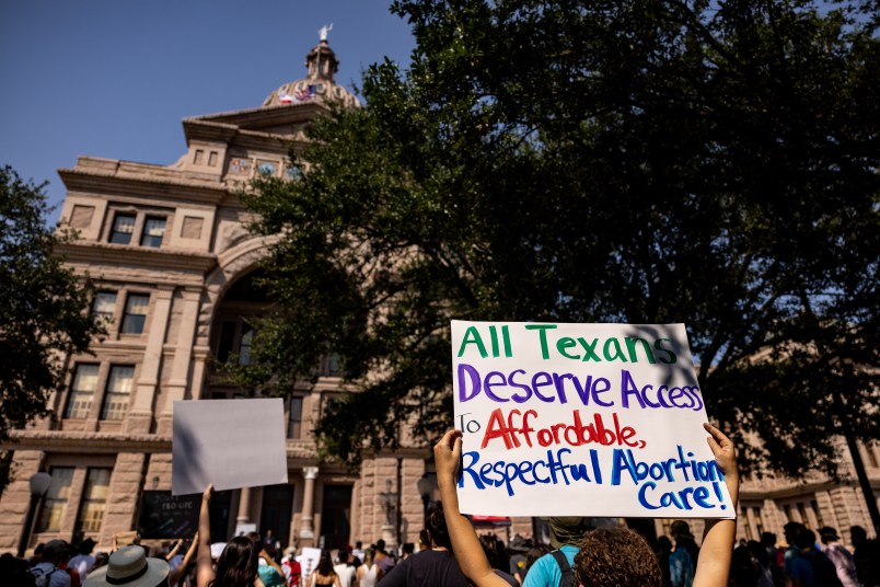 AUSTIN, TX - SEPTEMBER 11: Abortion rights activists rally at the Texas State Capitol on September 11, 2021 in Austin, Texas. Texas Lawmakers recently passed several pieces of conservative legislation, including SB8, which prohibits abortions in Texas after a fetal heartbeat is detected on an ultrasound, usually between the fifth and sixth weeks of pregnancy. (Photo by Jordan Vonderhaar/Getty Images)