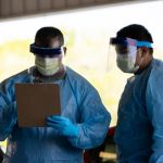SPRINGFIELD, TN - APRIL 18: Medical personnel work at a drive thru coronavirus (covid-19) testing site at Robertson County Fairgrounds on April 18, 2020 in Springfield, Tennessee. Tennessee drive thru testing sites now allow those without symptoms of coronavirus (covid-19) to receive testing. (Photo by Brett Carlsen/Getty Images)